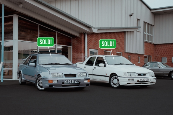 image of retro cars with SOLD! captions above them